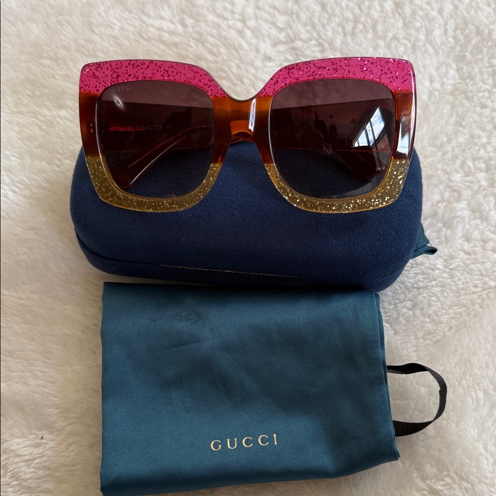 Gucci  Women's Sunglasses in Pink and Gold